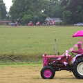 A stream of tractors comes in to the park, The Pink Ladies Tractor Run, Harleston and Gawdy Park, Norfolk - 5th July 2015