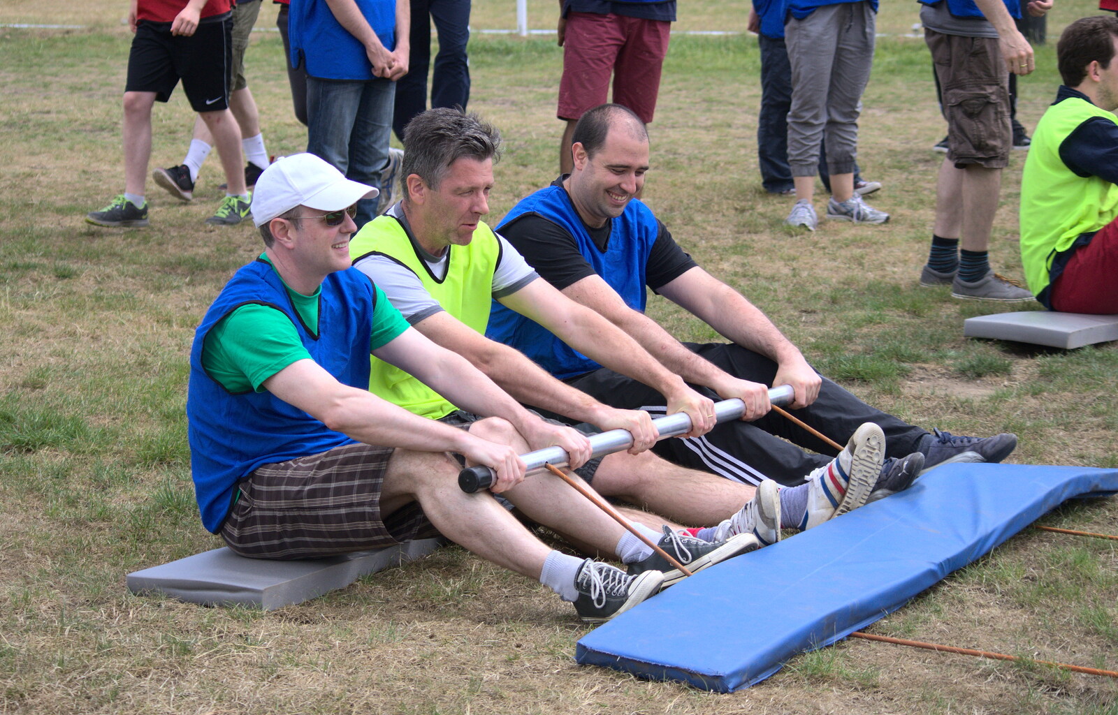 Mike, Steve and Michele practice their rowing from It's a SwiftKey Knockout, Richmond Rugby Club, Richmond, Surrey - 7th July 2015