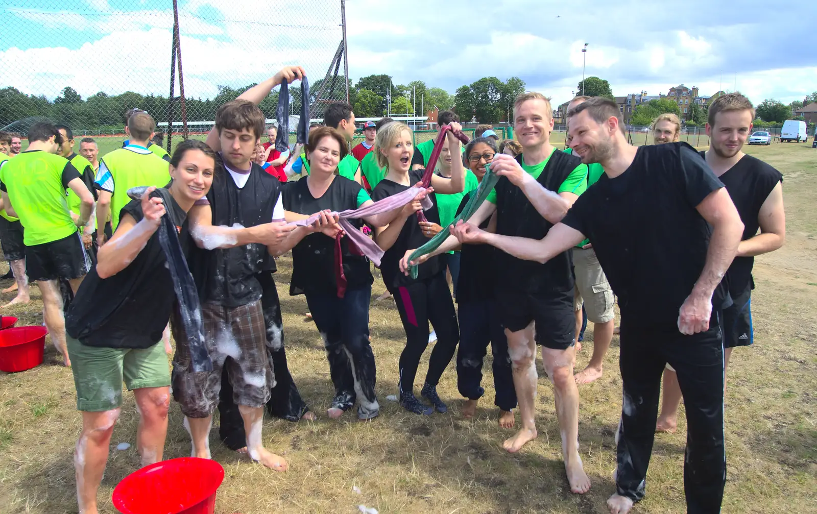 The Black Team hold up their socks, from It's a SwiftKey Knockout, Richmond Rugby Club, Richmond, Surrey - 7th July 2015