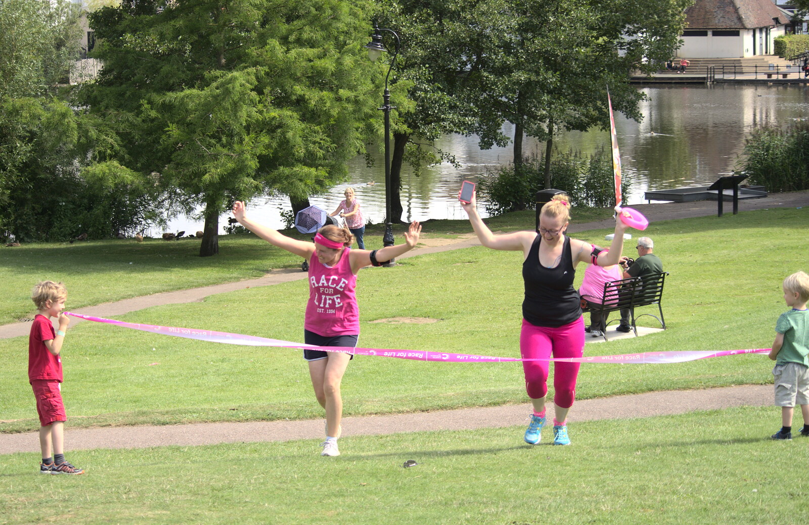 Isobel crosses the finishing line from A Race For Life, The Park, Diss, Norfolk - 16th August 2015