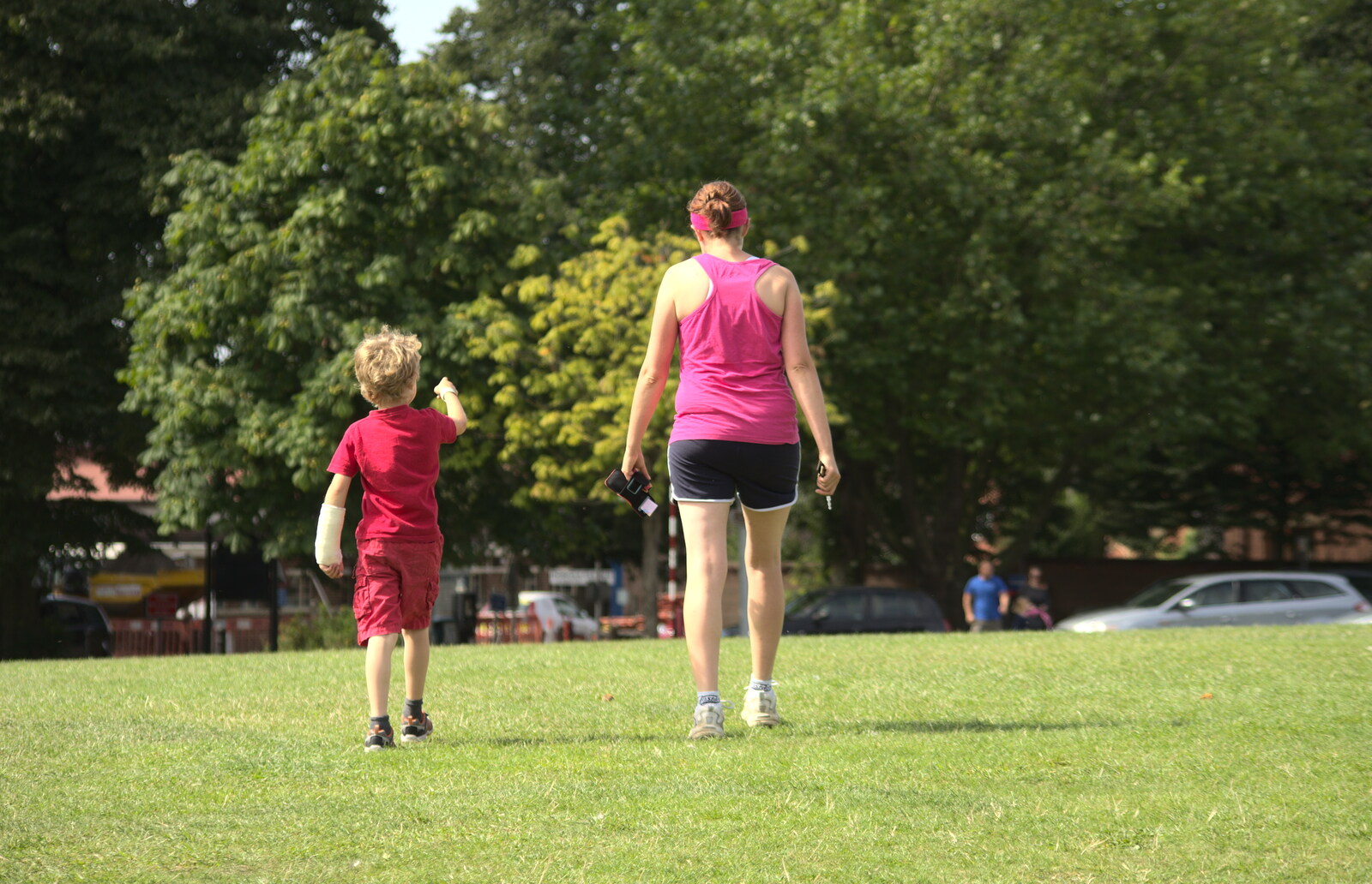 Fred and Isobel walk back to the car park from A Race For Life, The Park, Diss, Norfolk - 16th August 2015