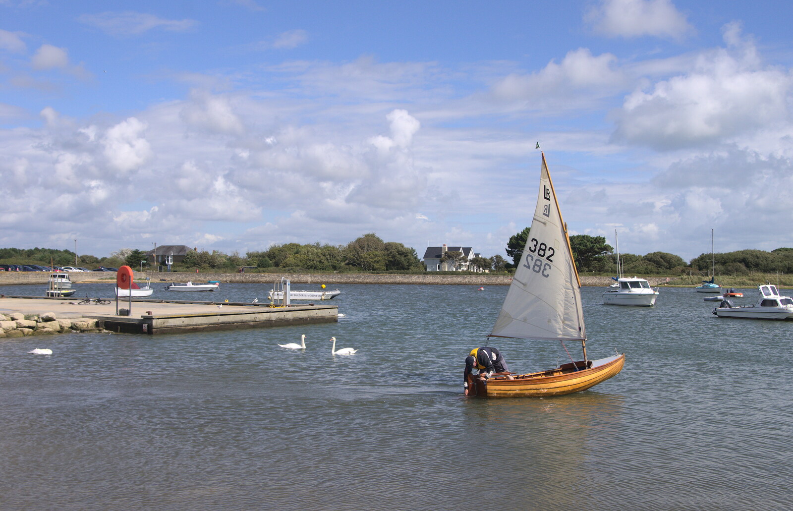The wooden dinghy heads out from A Trip to Hurst Castle, Keyhaven, Hampshire - 28th August 2015