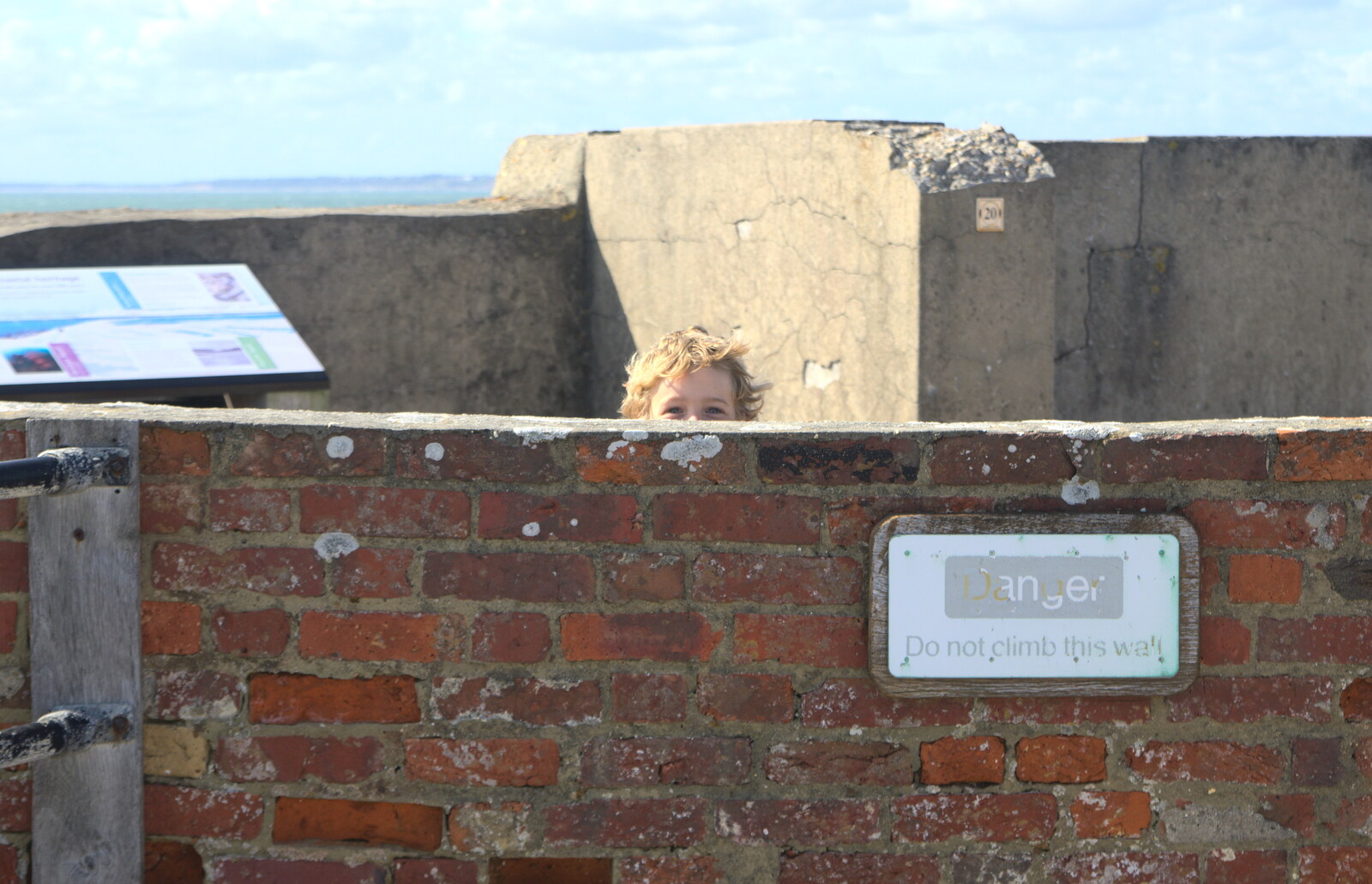 Fred peeps out from behind a wall from A Trip to Hurst Castle, Keyhaven, Hampshire - 28th August 2015