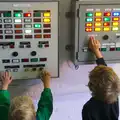 The boys play with a lighthouse control panel, A Trip to Hurst Castle, Keyhaven, Hampshire - 28th August 2015