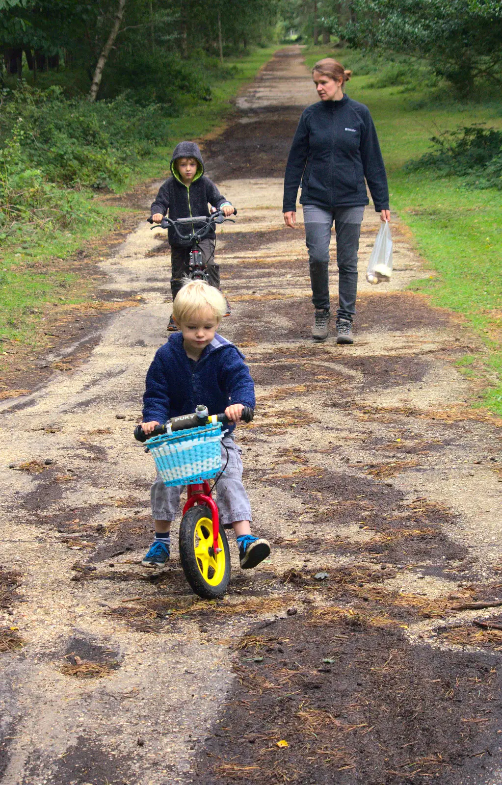 Isobel has a bag of mushrooms from a stranger, from Camping at Roundhills, Brockenhurst, New Forest, Hampshire - 29th August 2015