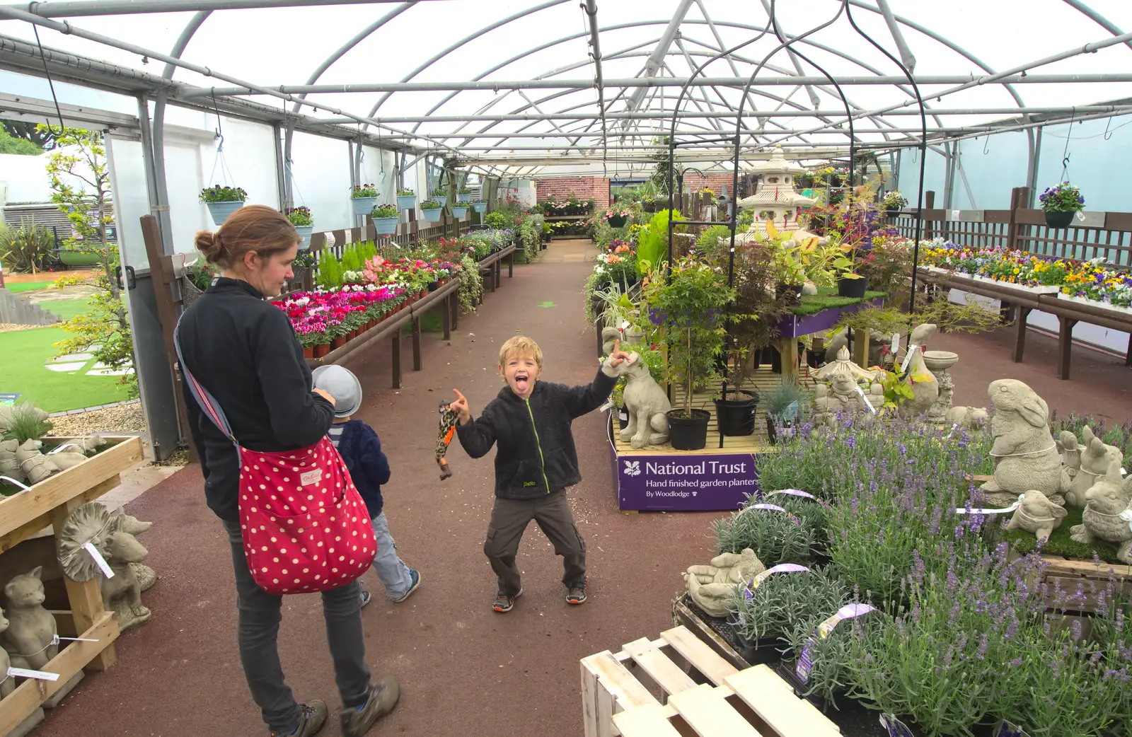 Fred goes nuts in the garden centre, from Camping at Roundhills, Brockenhurst, New Forest, Hampshire - 29th August 2015