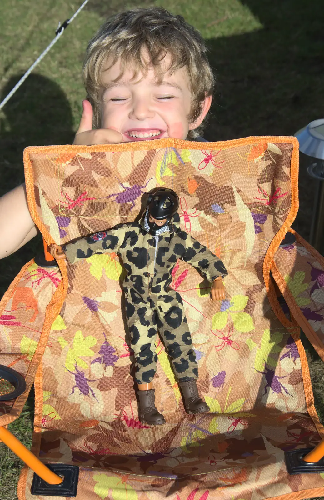 Fred shows off his new Action Man, from Camping at Roundhills, Brockenhurst, New Forest, Hampshire - 29th August 2015