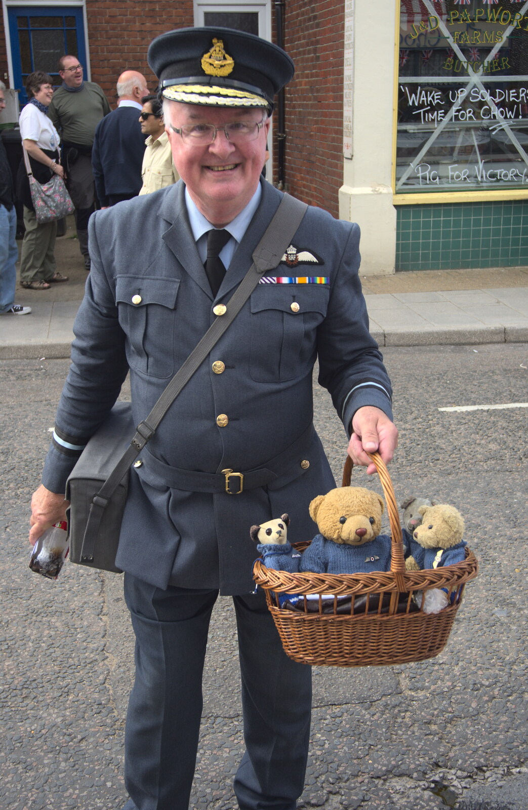 An RAF chap with a basket full of RAF bears from A Steamy 1940s Day Out, Holt and Sheringham, Norfolk - 20th September 2015