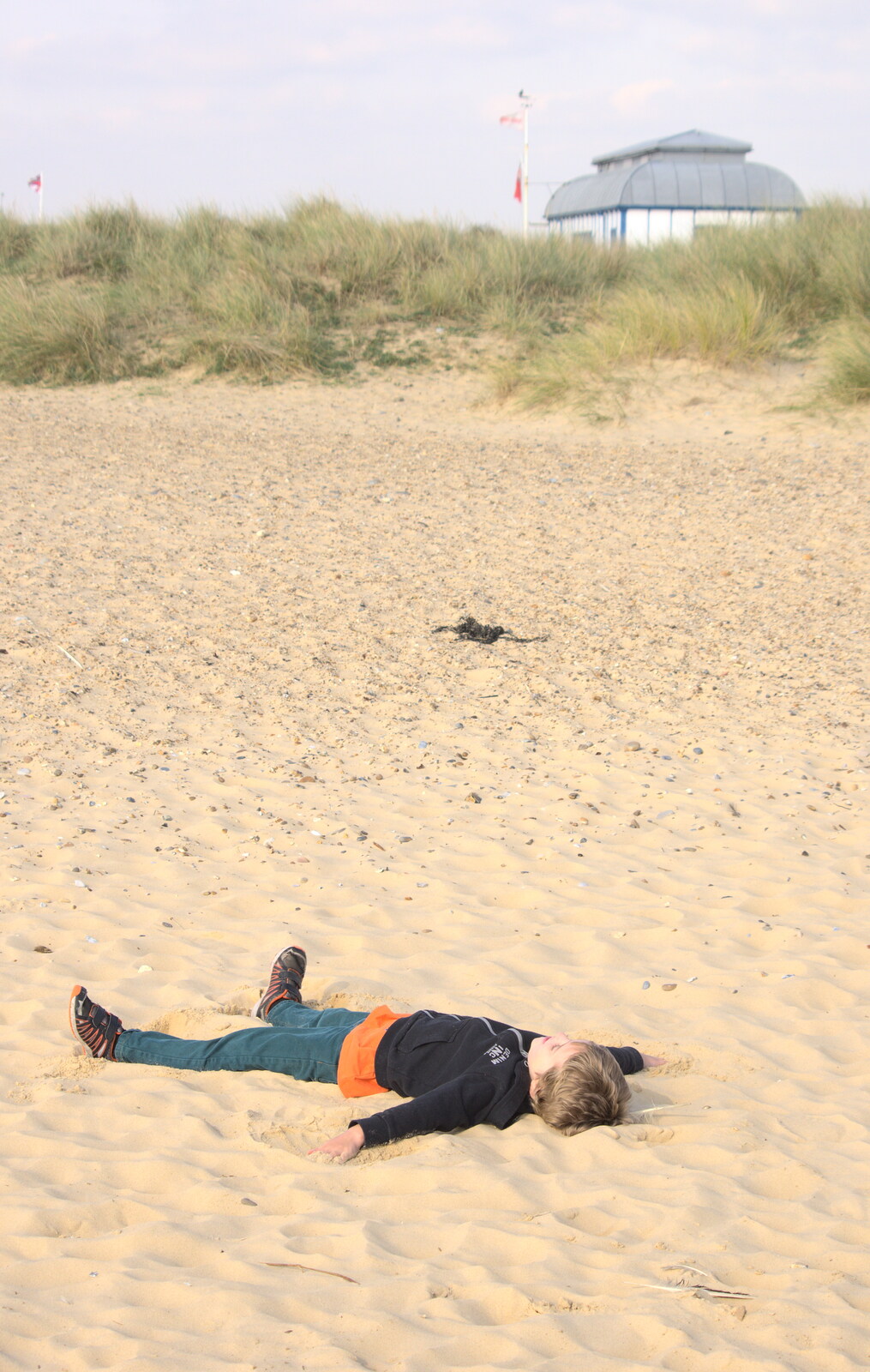 Fred does sand angels from A DC3 Quiz and the Alfred Corry, Southwold, Suffolk, - 9th October 2015