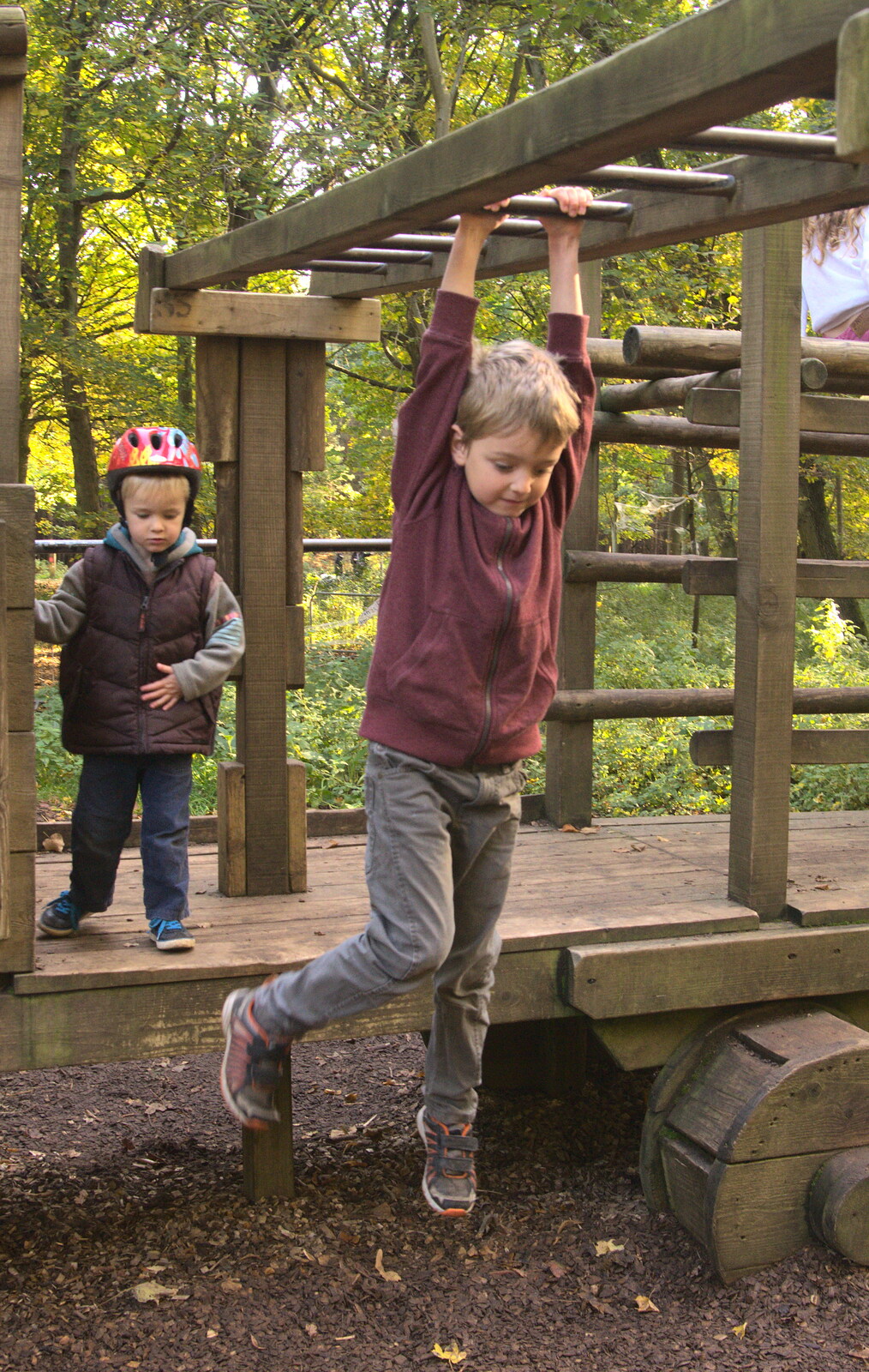 Fred on monkey bars, with a recently-broken arm from A Day at High Lodge, Brandon Forest, Suffolk - 26th October 2015