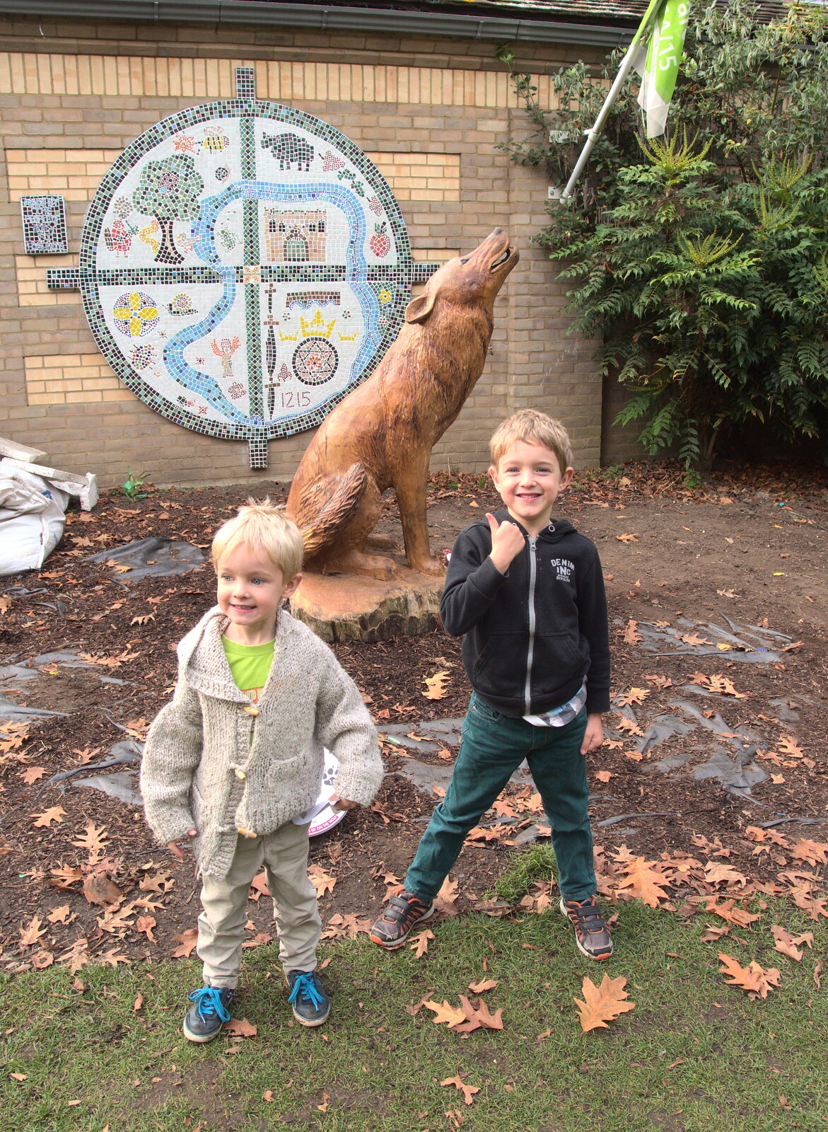The boys stand in front of a carved wooden wolf from Abbey Gardens in Autumn, Bury St. Edmunds, Suffolk - 27th October 2015