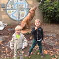 The boys stand in front of a carved wooden wolf, Abbey Gardens in Autumn, Bury St. Edmunds, Suffolk - 27th October 2015