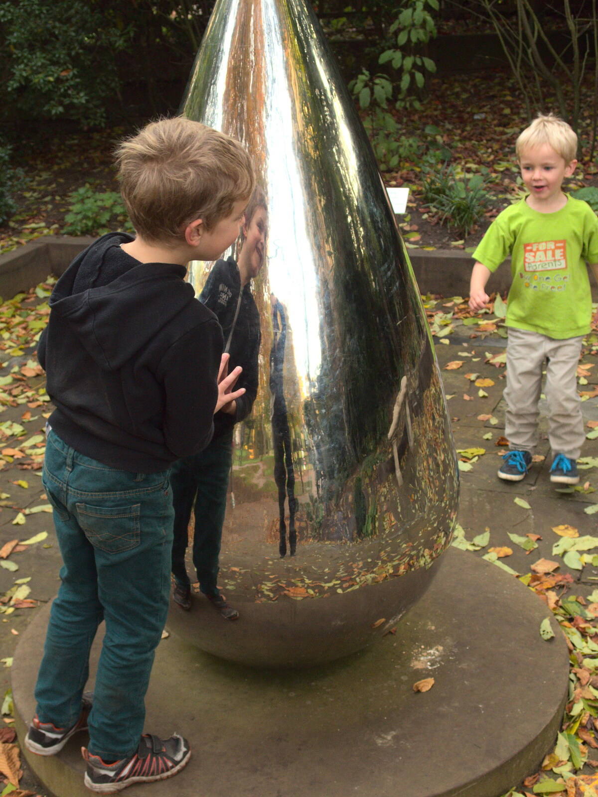The boys mess around on a giant steel teardrop from Abbey Gardens in Autumn, Bury St. Edmunds, Suffolk - 27th October 2015