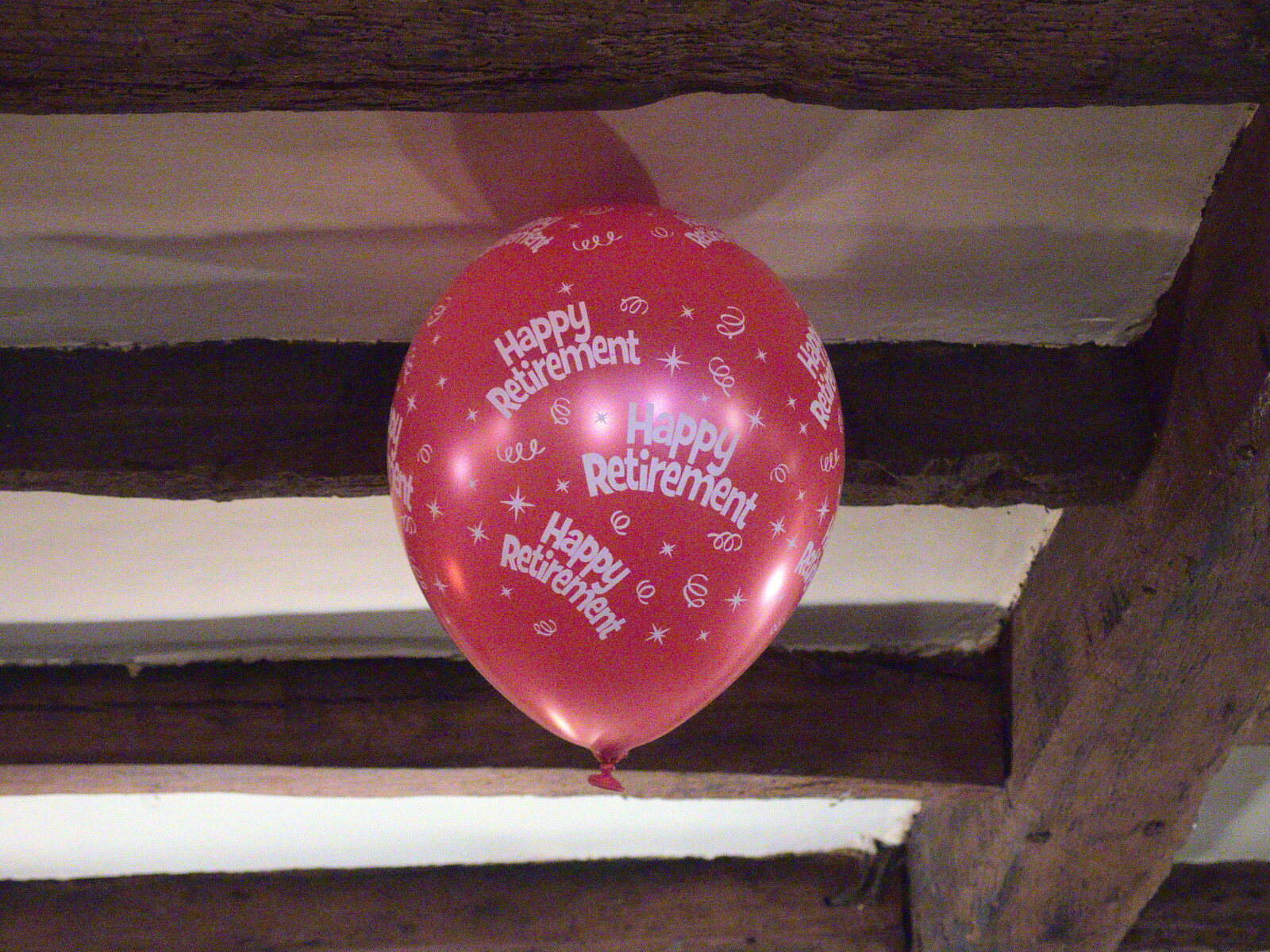 A retirement balloon floats up to the ceiling from John Willy's 65th and Other Stories, The Swan, Brome, Suffolk - 31st October 2015