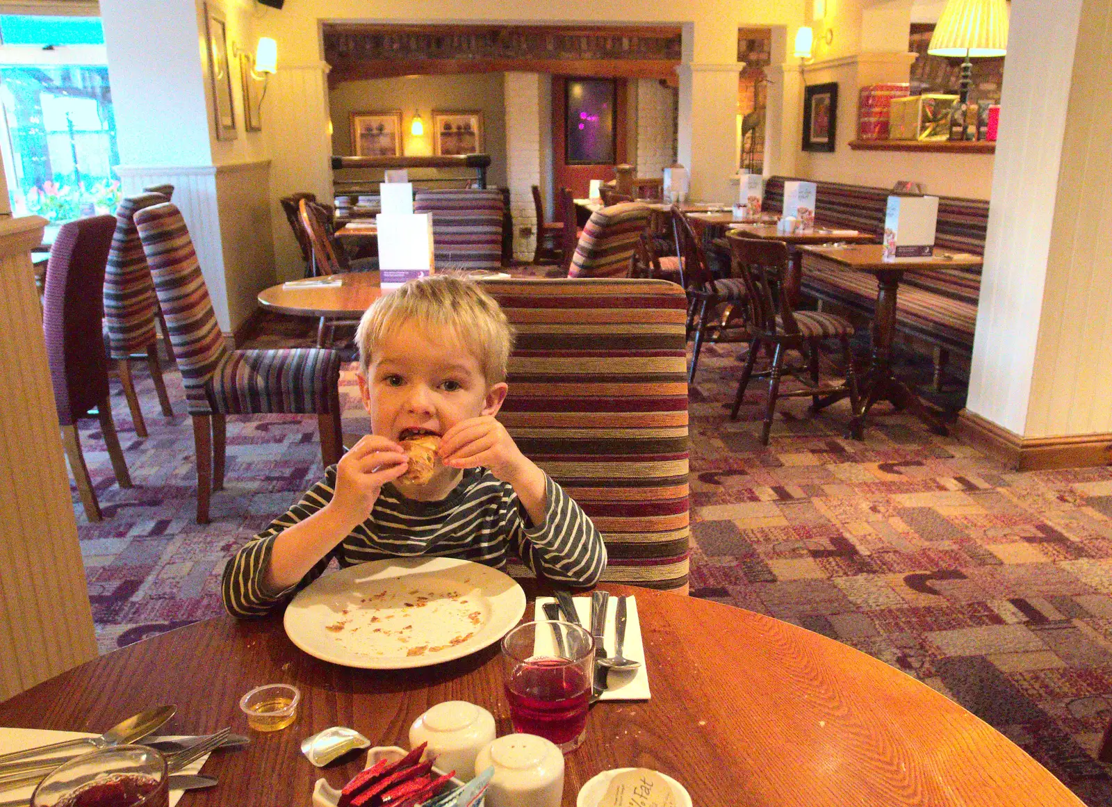 Gabes eats a pastry, from A Party and a Road Trip to Chester, Suffolk and Cheshire - 20th December 2015