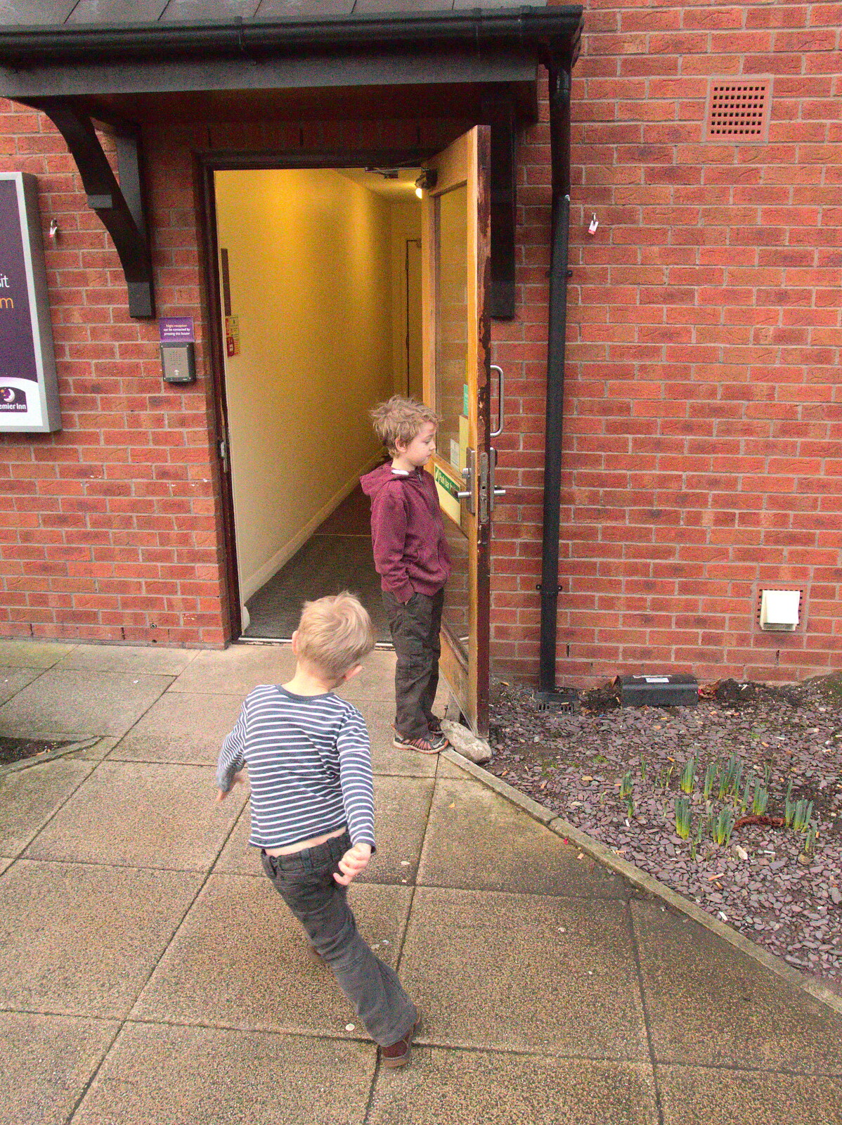 The boys run around near the exit from A Party and a Road Trip to Chester, Suffolk and Cheshire - 20th December 2015