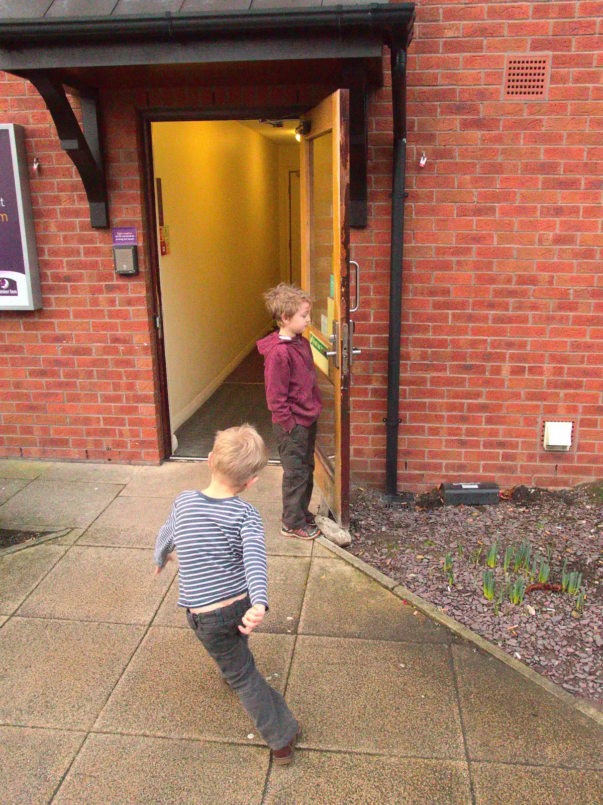 The boys run around near the exit, from A Party and a Road Trip to Chester, Suffolk and Cheshire - 20th December 2015