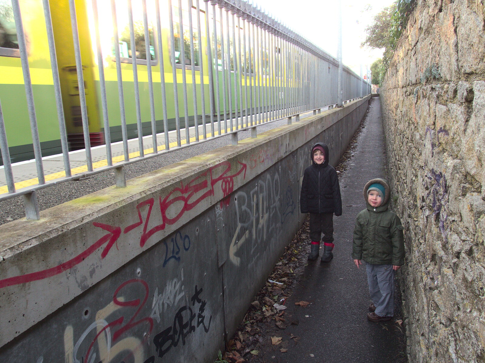 The boys on the path up to Blackrock DART station from Christmas Eve in Dublin and Blackrock, Ireland - 24th December 2015