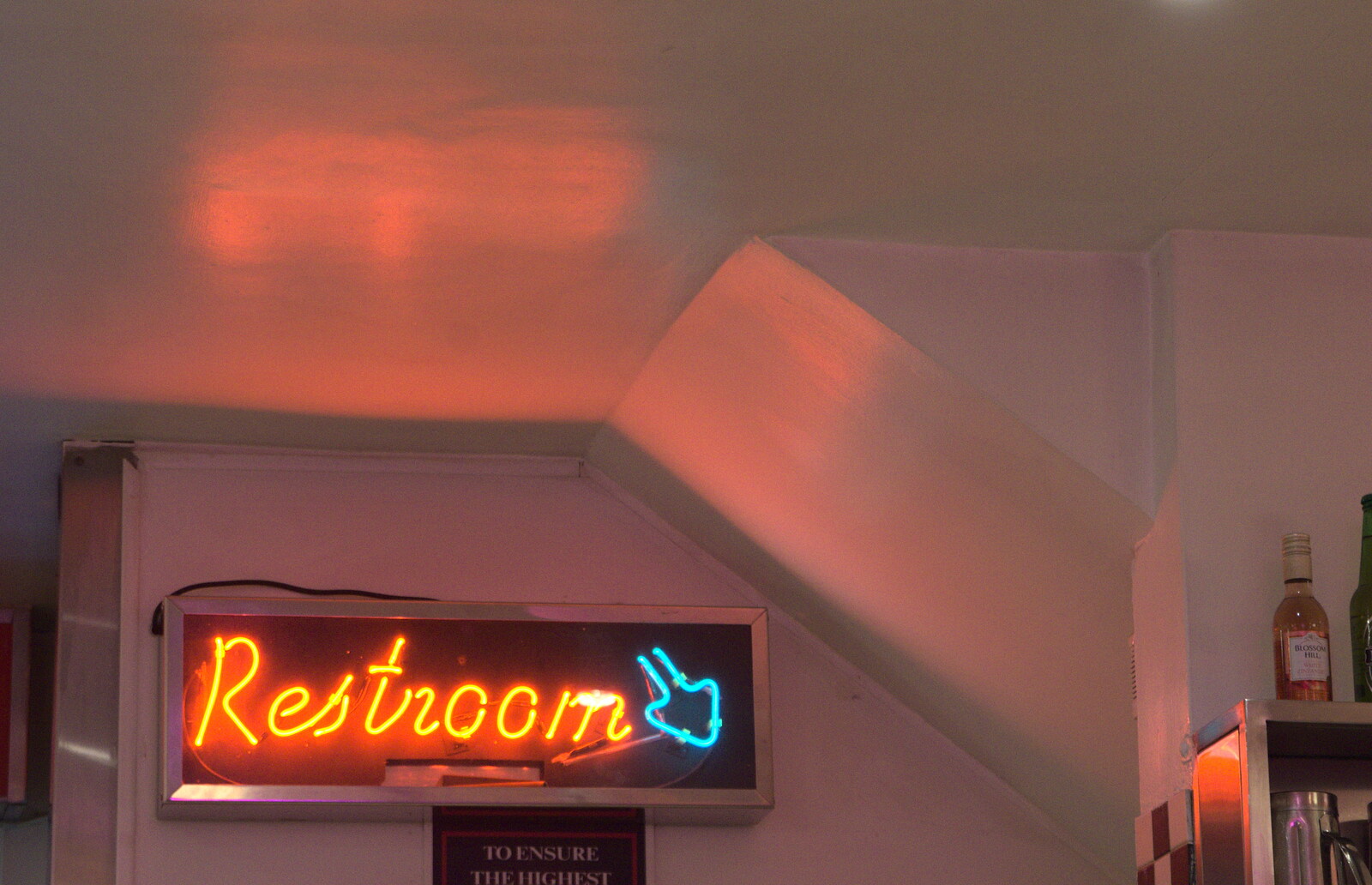A neon restroom sign from Christmas Eve in Dublin and Blackrock, Ireland - 24th December 2015