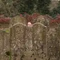 Harry peeks up from behind the gravestones, New Year's Eve With The BBs, The Barrel, Banham, Norfolk - 31st December 2015