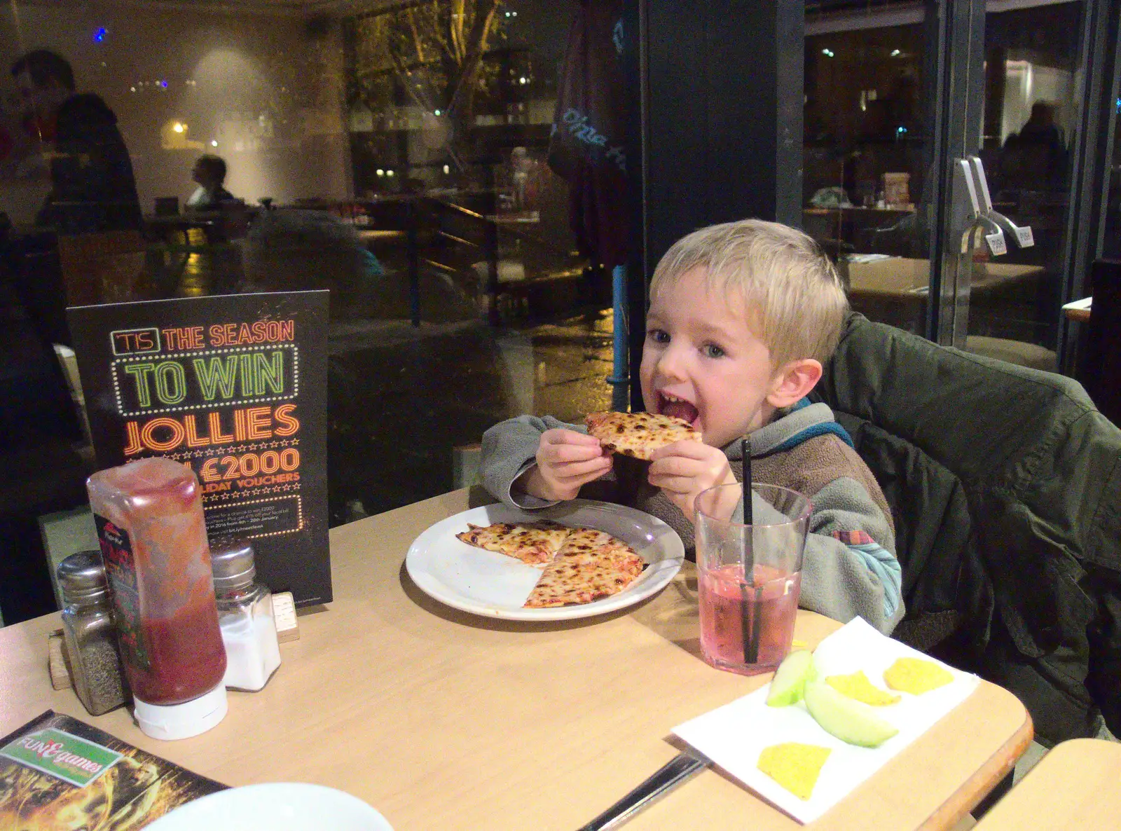 Harry scoffs pizza, from Ten-Pin Bowling, Riverside, Norwich - 3rd January 2016