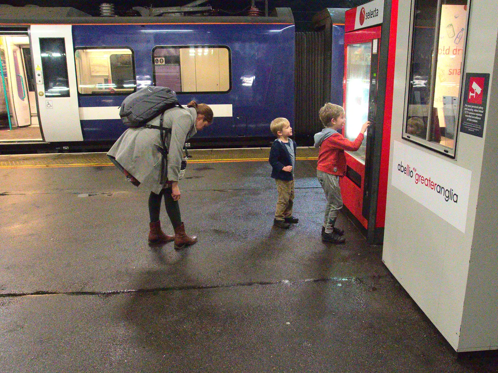 The boys check out a food machine, from Isobel Goes to Lyon, Ipswich Station, Burrell Road - 24th January 2016