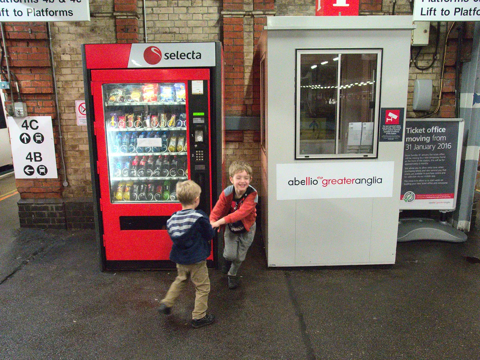 The boys gravitate to the food machine, from Isobel Goes to Lyon, Ipswich Station, Burrell Road - 24th January 2016