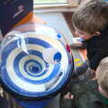 The boys do their favourite coin-spin thing, A Trip to Aldeburgh, Suffolk - 7th February 2016