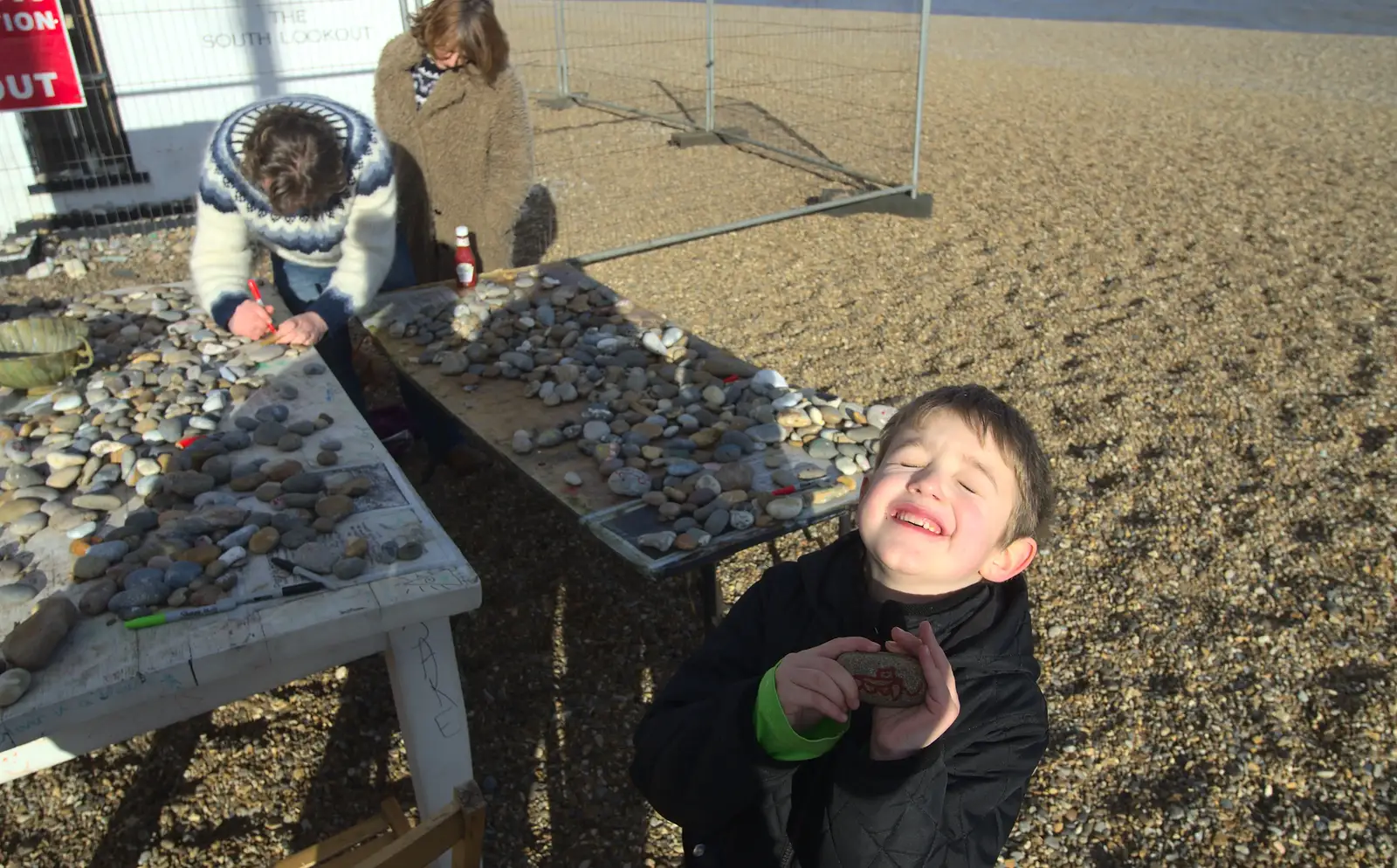 Fred holds up his decorated rock, from A Trip to Aldeburgh, Suffolk - 7th February 2016