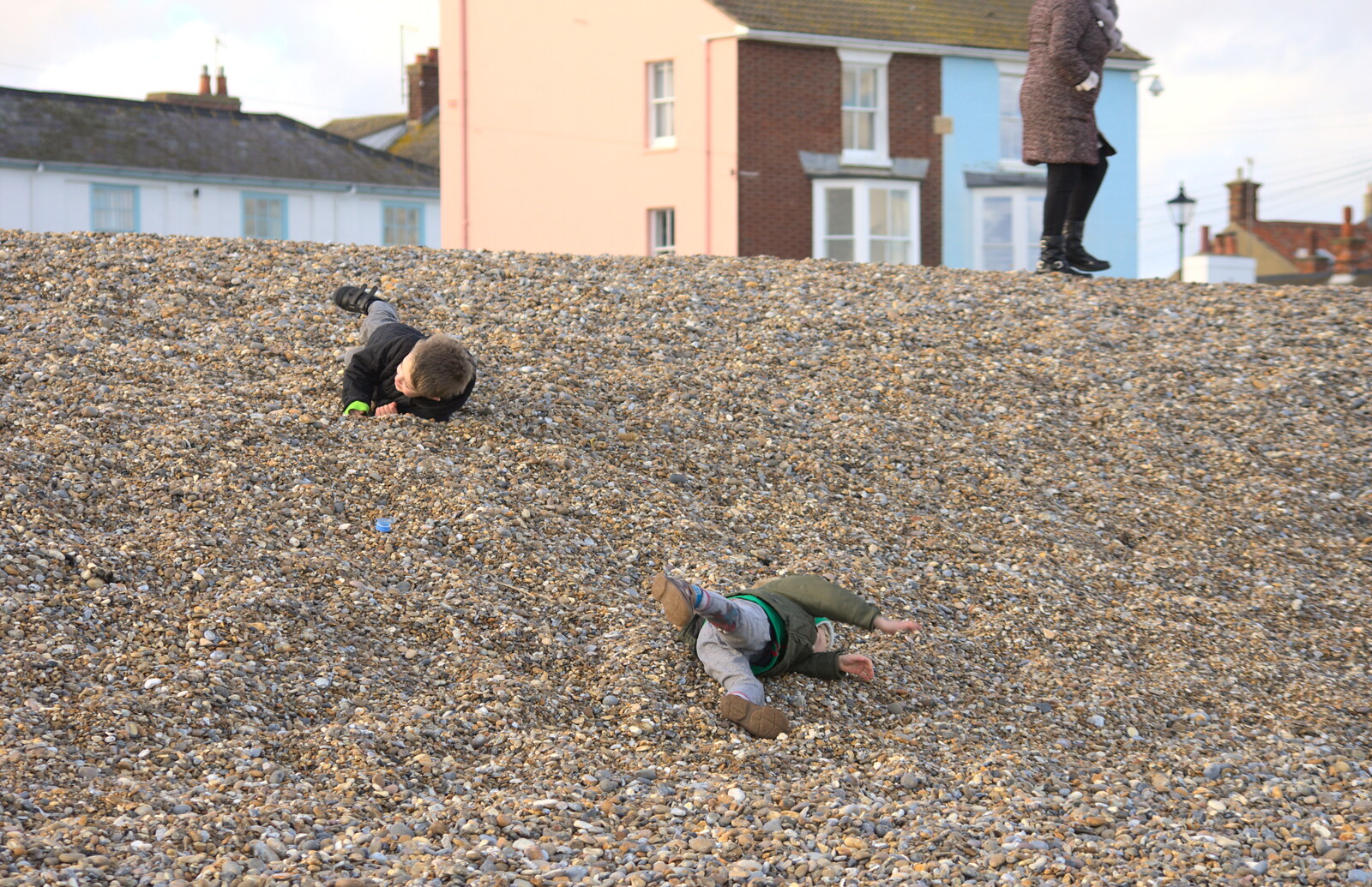 A Trip to Aldeburgh, Suffolk - 7th February 2016: Fred and Harry roll down the shingle hill