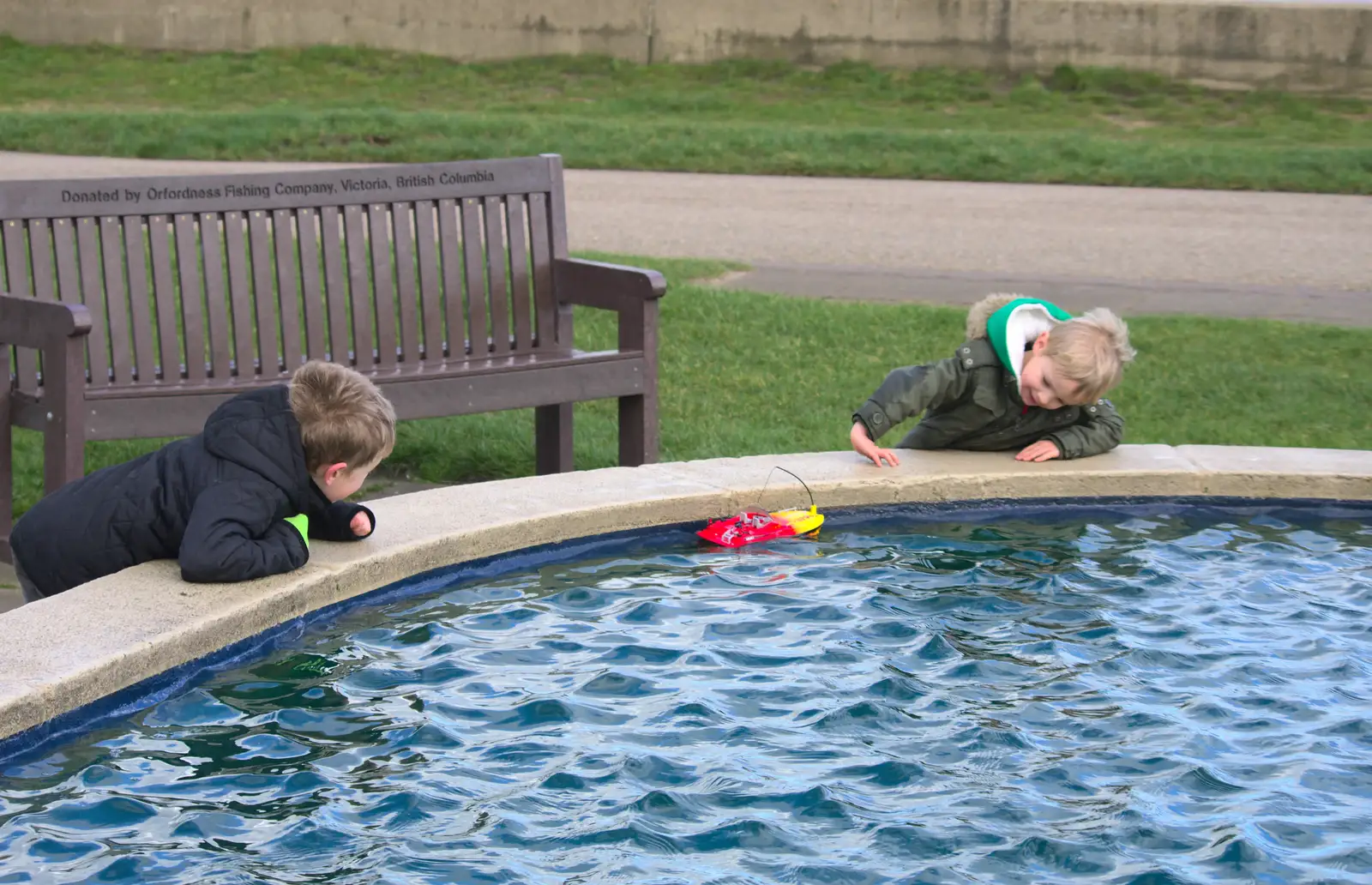 The boys are fascinated by a radio-controlled boat, from A Trip to Aldeburgh, Suffolk - 7th February 2016