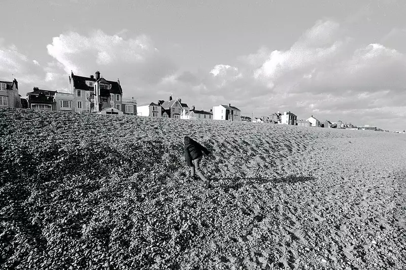 Fred climbs up the gravel cliff, from Days on the Beach: Dunwich and Aldeburgh, Suffolk - 15th February 2016