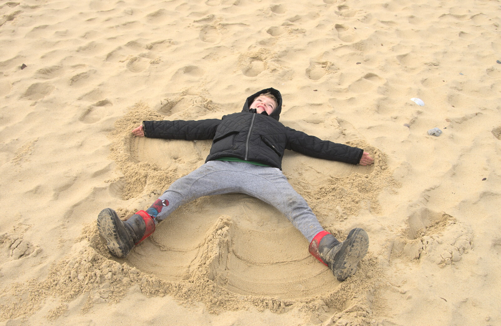 Fred does the sand-angel thing from The Seals of Horsey Gap, Norfolk - 21st February 2016
