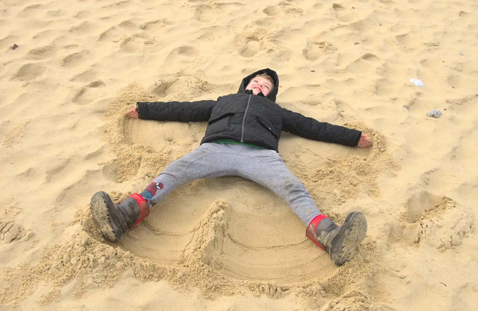 Fred does the sand-angel thing, from The Seals of Horsey Gap, Norfolk - 21st February 2016