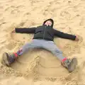 Fred does the sand-angel thing, The Seals of Horsey Gap, Norfolk - 21st February 2016