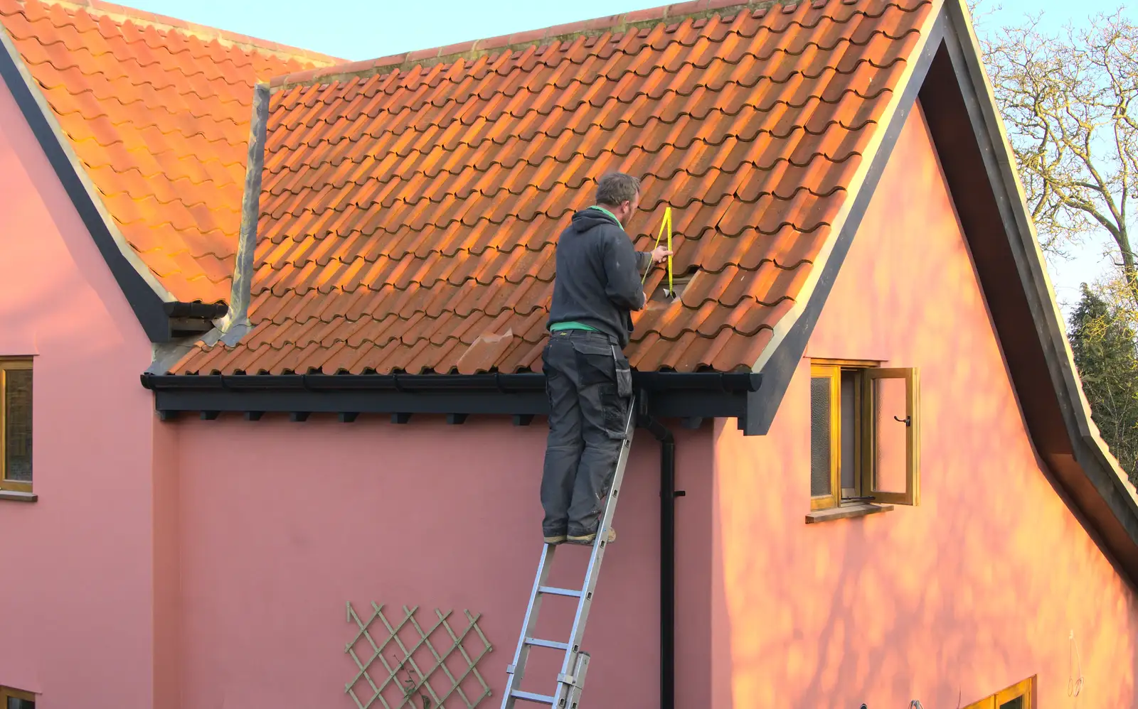 Andrew measures up for a foul-air vent pipe, from Isobel's Hartismere Run, Castleton Way, Eye, Suffolk - 16th March 2016