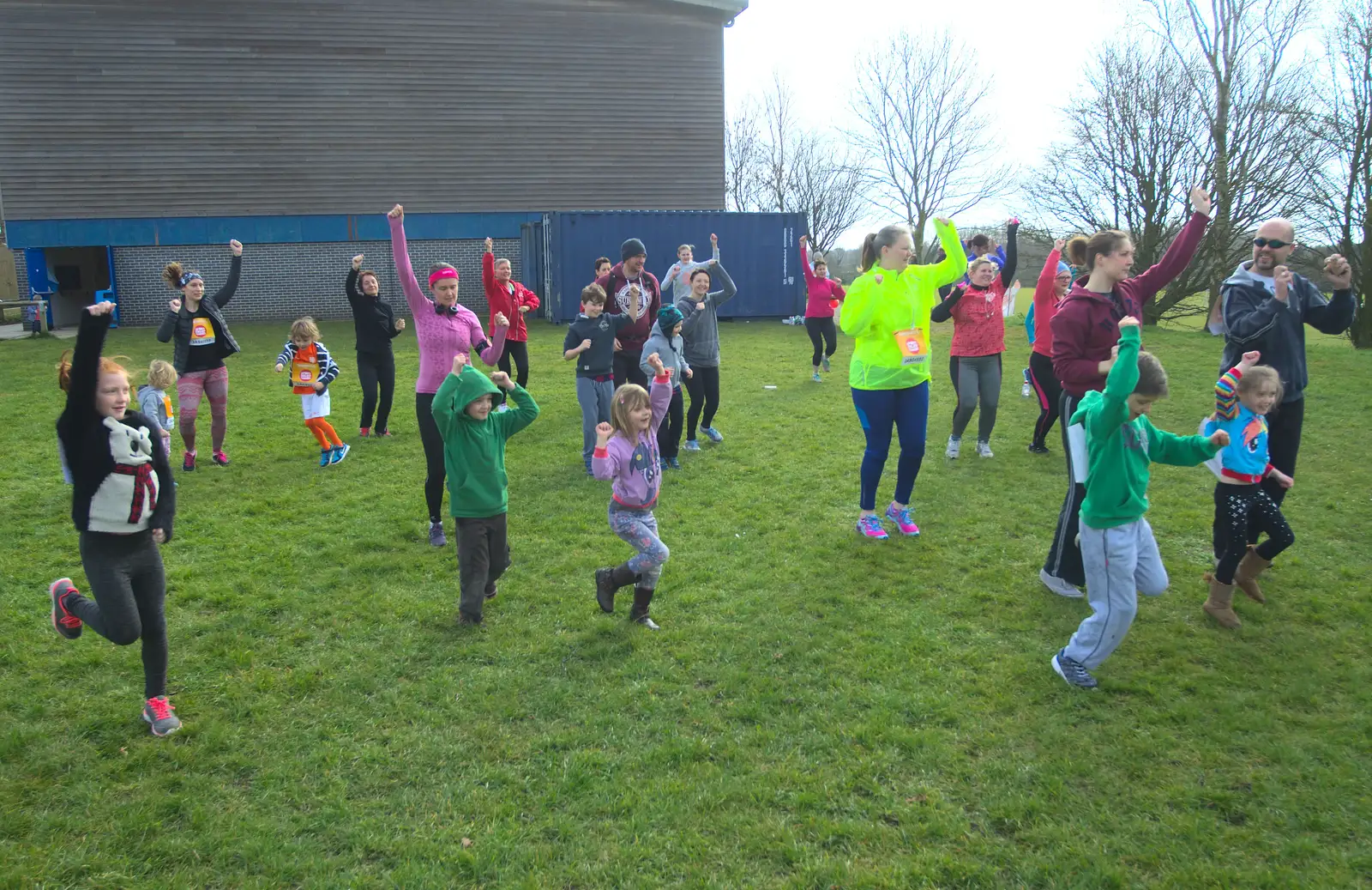 Warming-up exercises on the playing field, from Isobel's Hartismere Run, Castleton Way, Eye, Suffolk - 16th March 2016