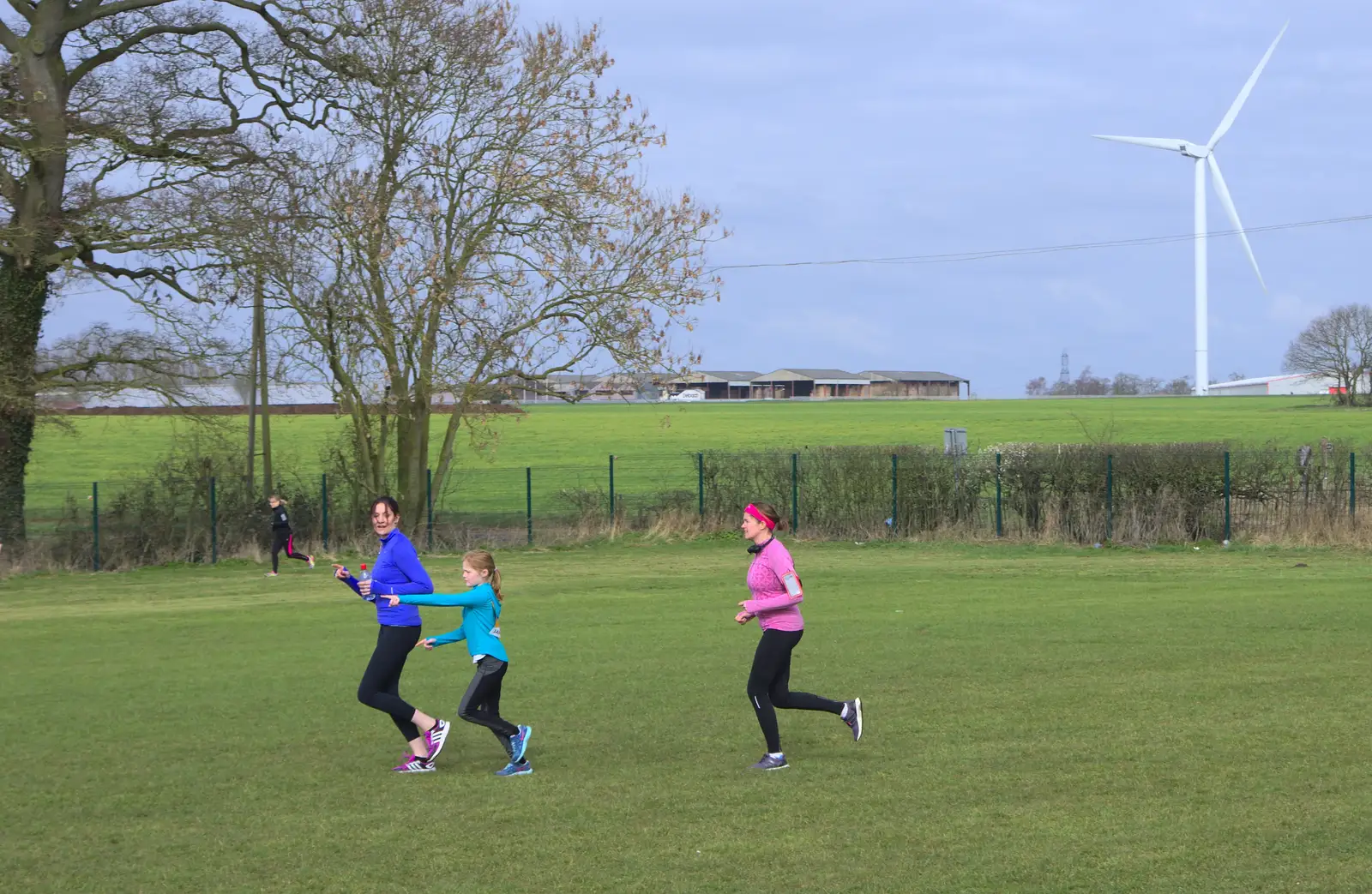 Running around the field, from Isobel's Hartismere Run, Castleton Way, Eye, Suffolk - 16th March 2016