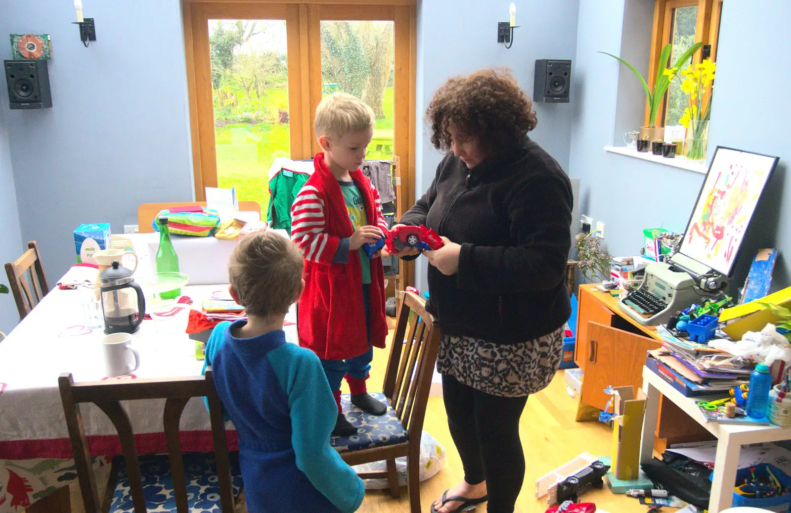 Louise figures a transformer out, from Harry's Birthday, Brome, Suffolk - 28th March 2016