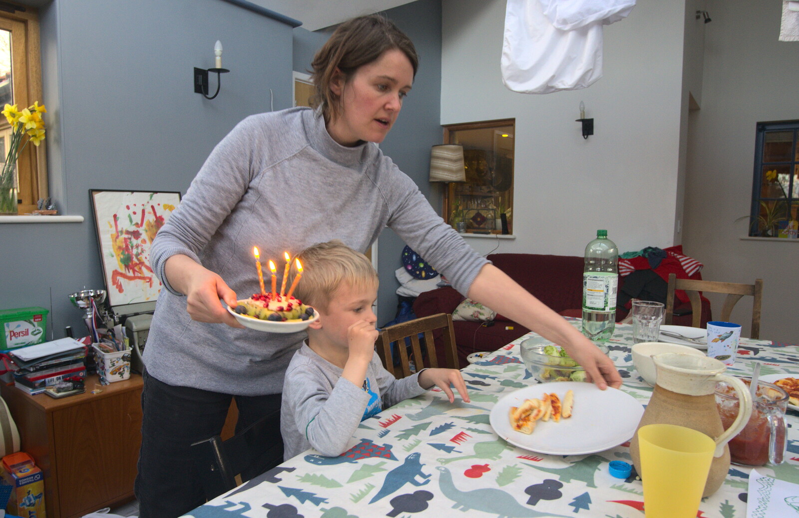 Isobel brings a cake in from Harry's Birthday, Brome, Suffolk - 28th March 2016