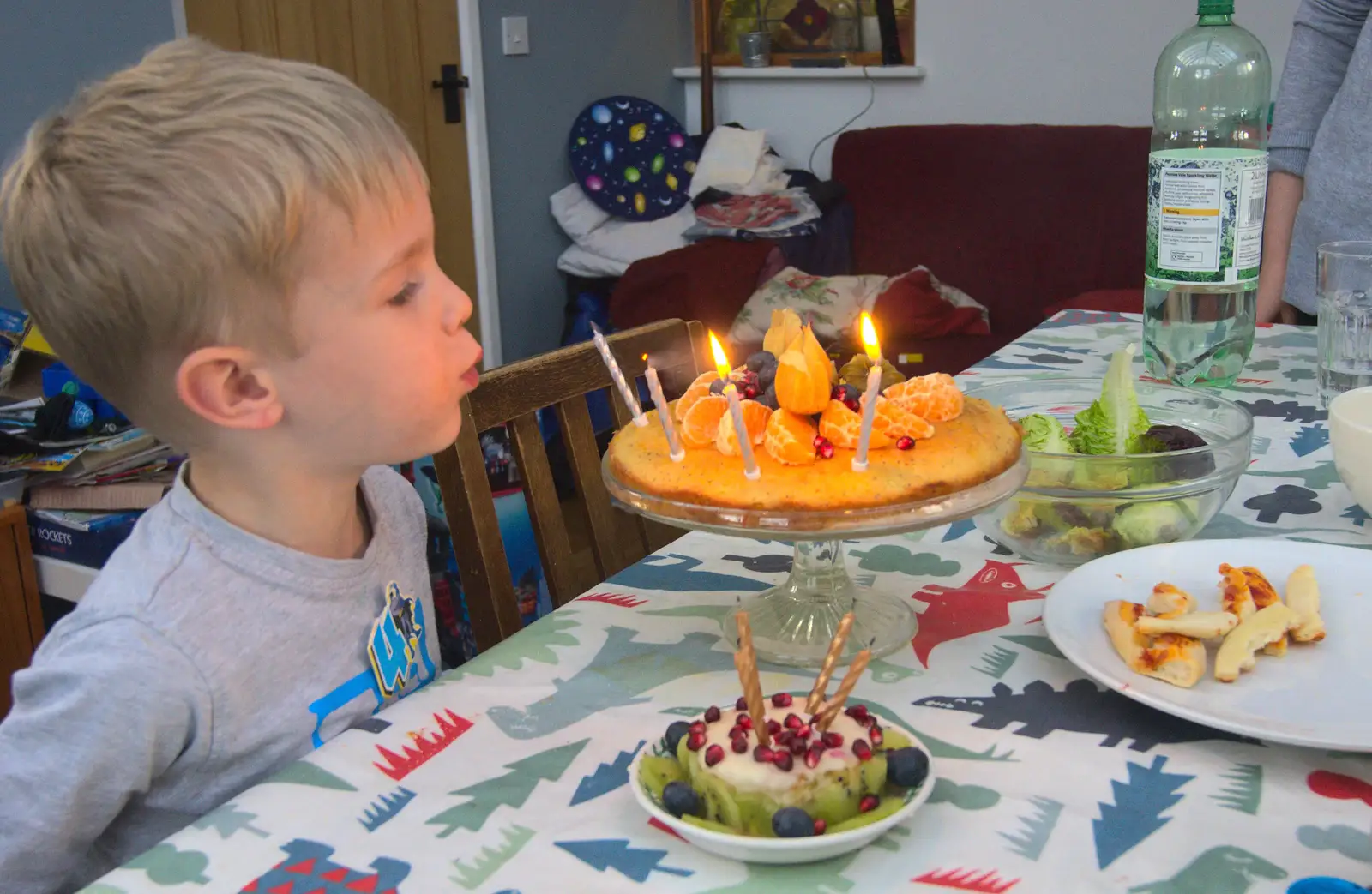 Harry blows out his candles, from Harry's Birthday, Brome, Suffolk - 28th March 2016