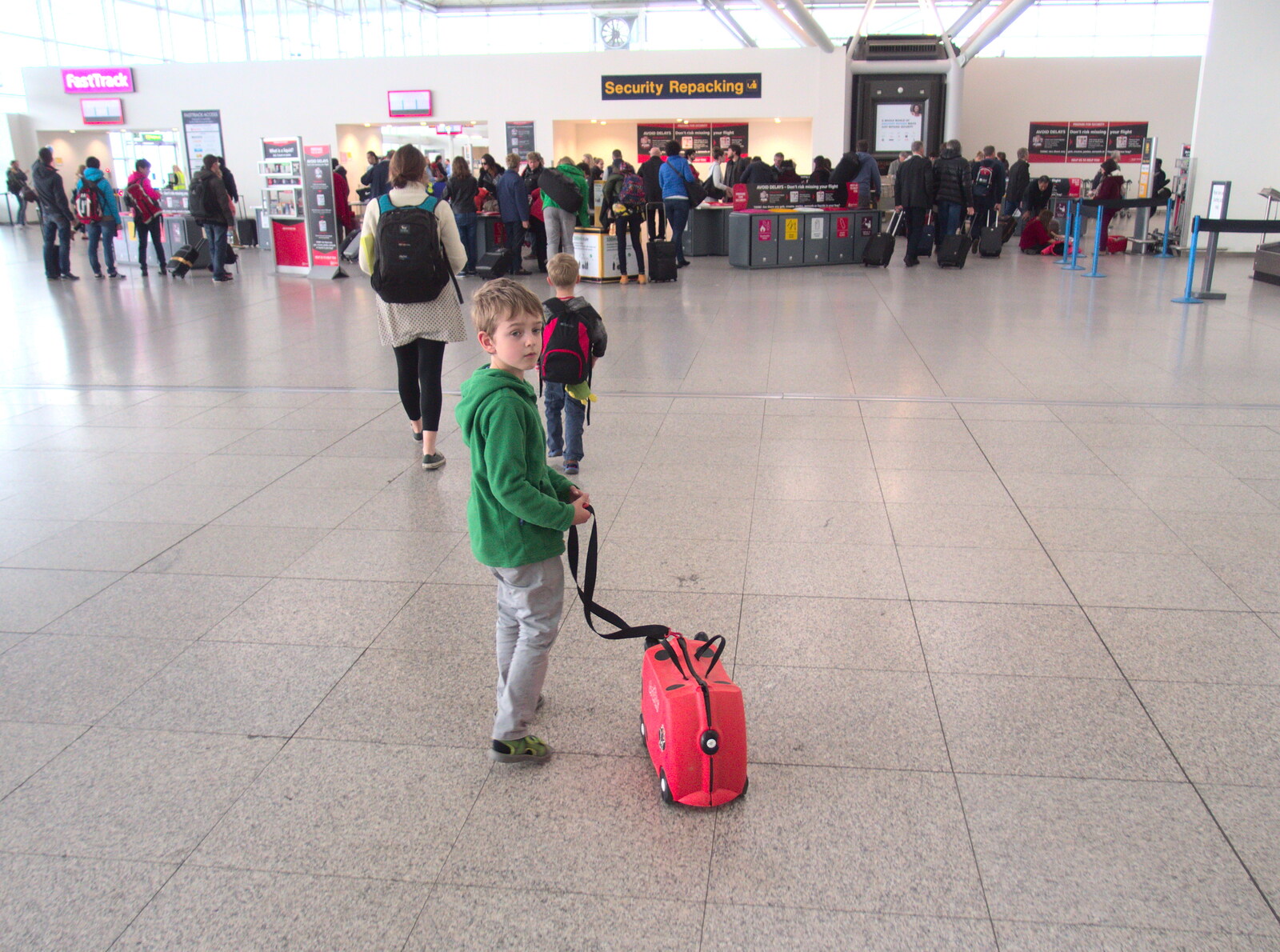 Fred hauls his Trunki around the check-in area from A Trip to Albufeira: The Hotel Paraiso, Portugal - 3rd April 2016
