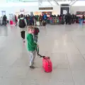 Fred hauls his Trunki around the check-in area, A Trip to Albufeira: The Hotel Paraiso, Portugal - 3rd April 2016