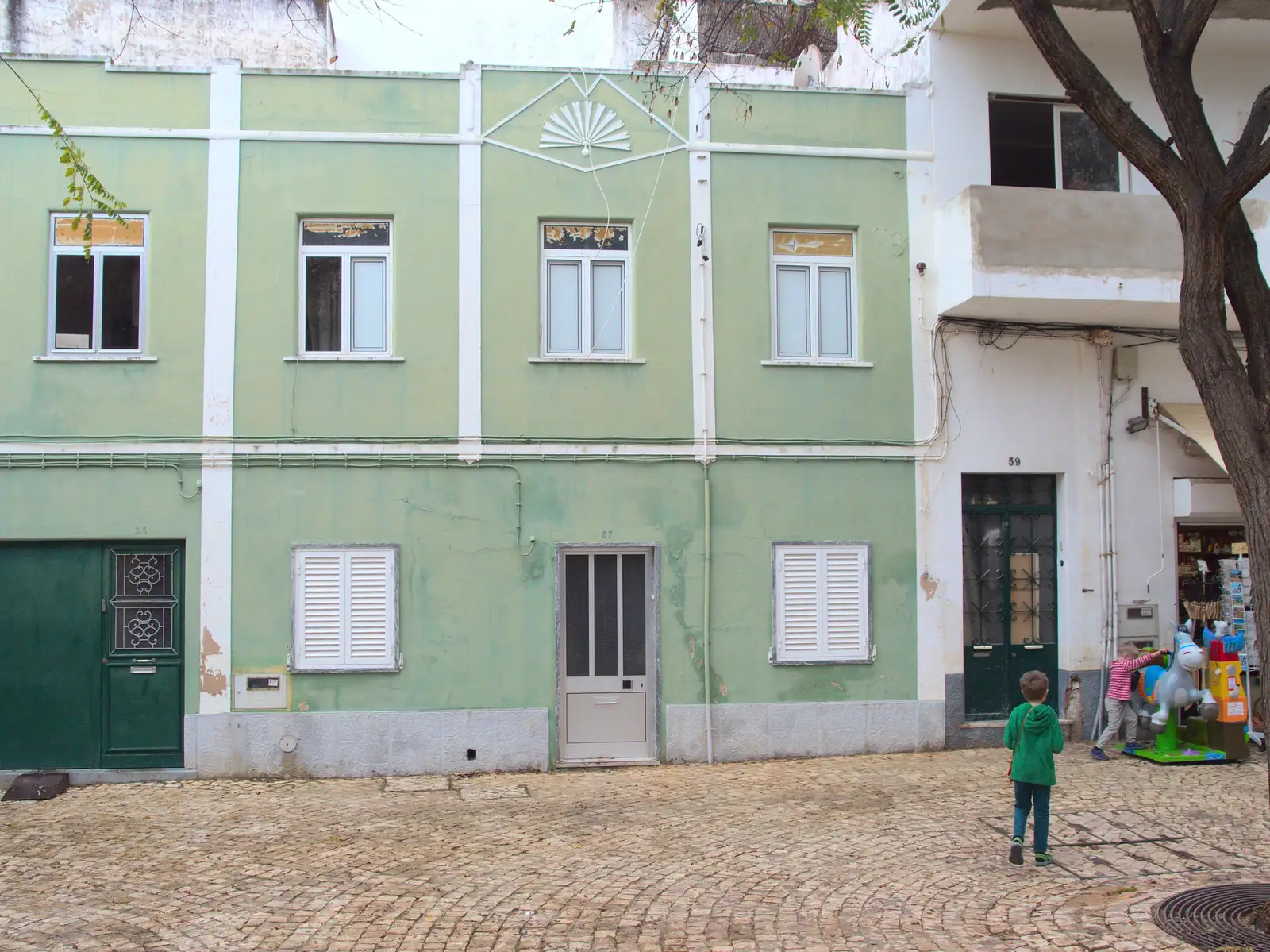 Fred by a pale-green building, from A Trip to Albufeira: The Hotel Paraiso, Portugal - 3rd April 2016