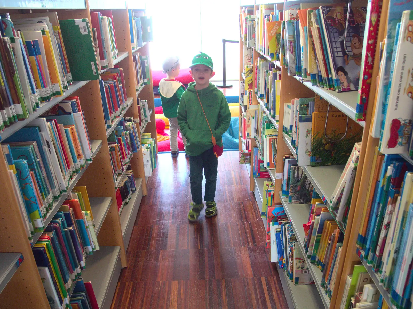 Fred and a wall of books, from A Trip to Albufeira: The Hotel Paraiso, Portugal - 3rd April 2016