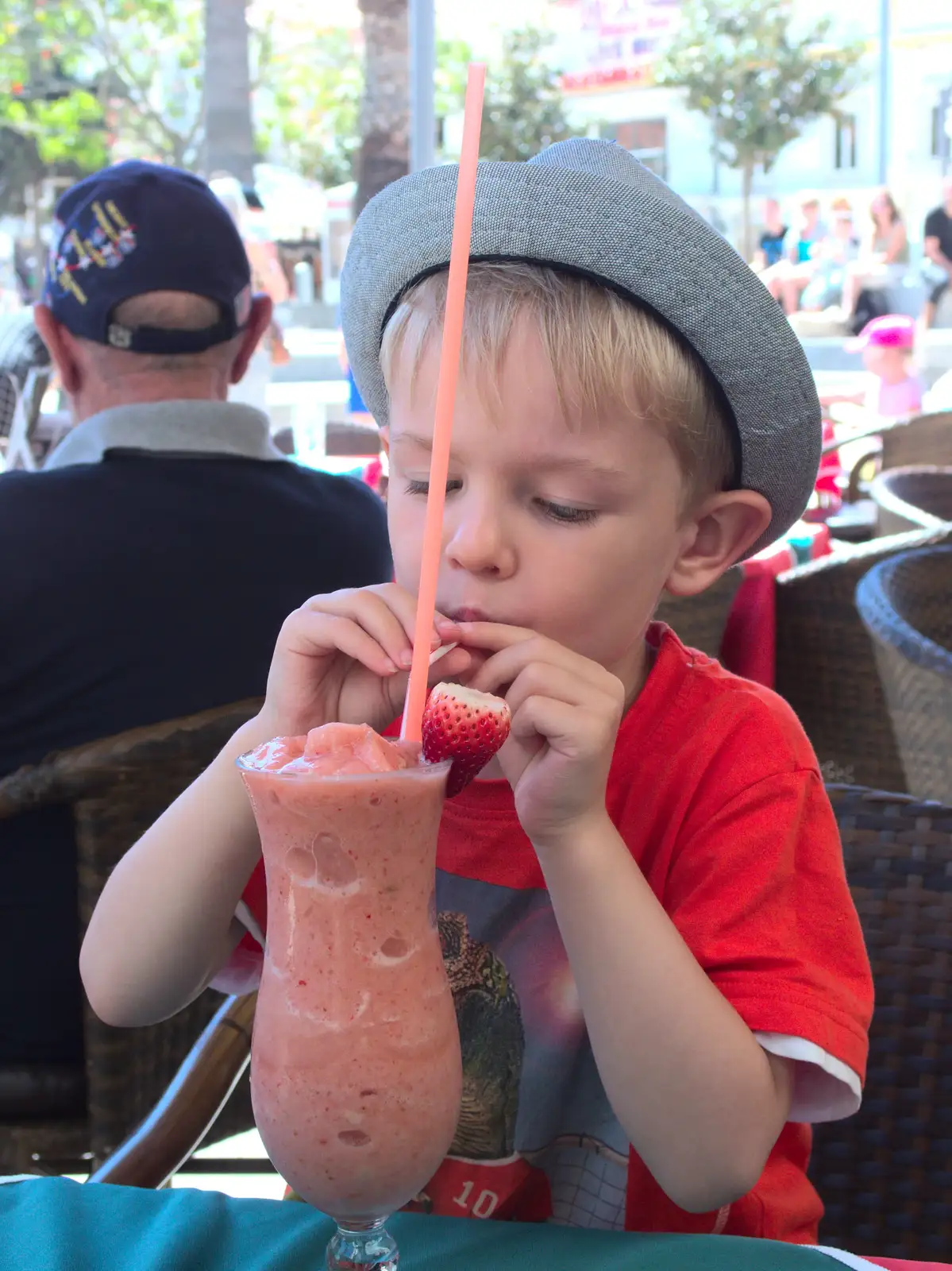 Harry slurps on a Harry's Bar milk shake, from Gary and Vanessa's Barbeque, Alcantarilha, Algarve, Portugal - 7th April 2016