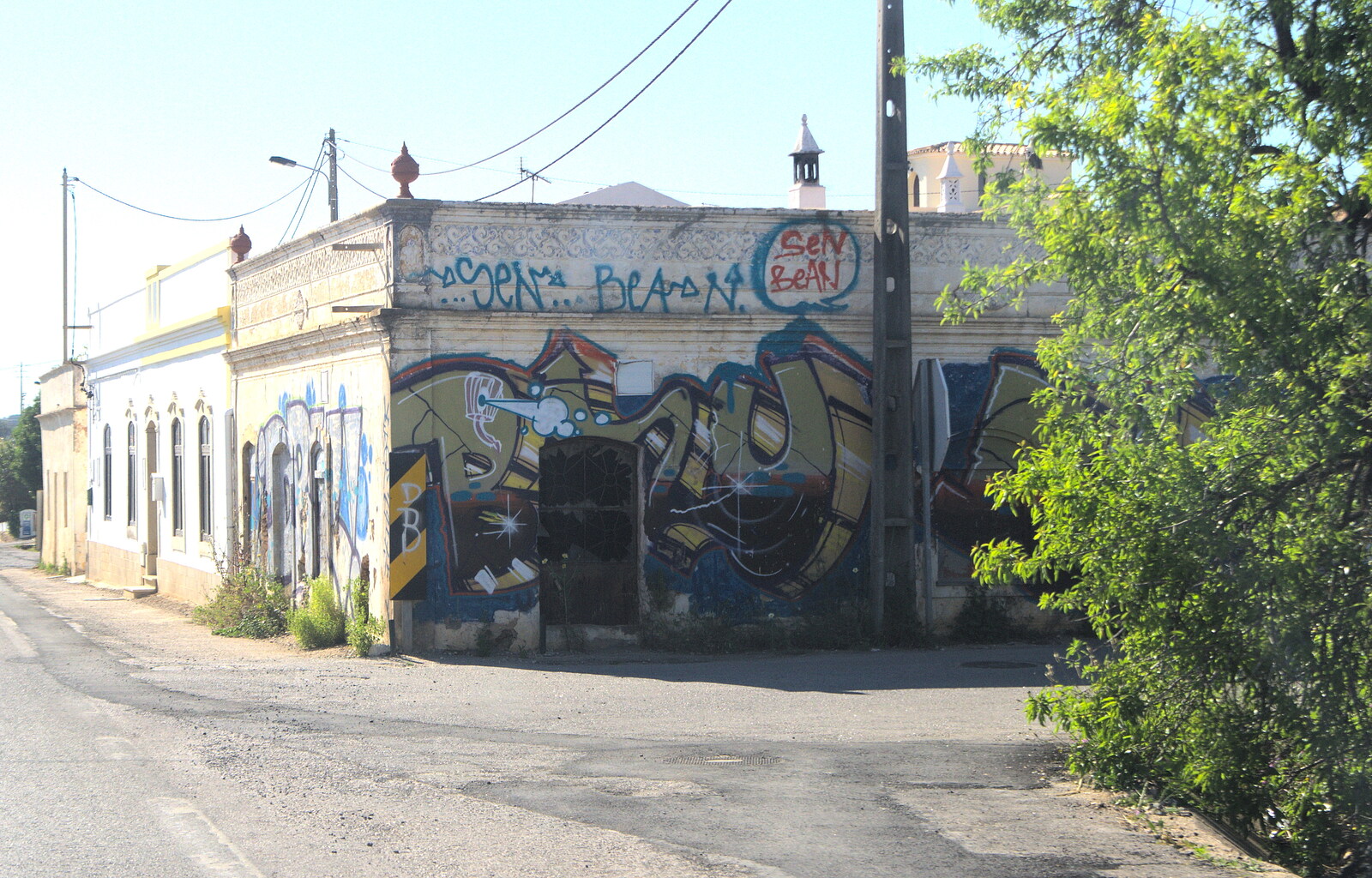 A heavily-graffiti'd building from Gary and Vanessa's Barbeque, Alcantarilha, Algarve, Portugal - 7th April 2016