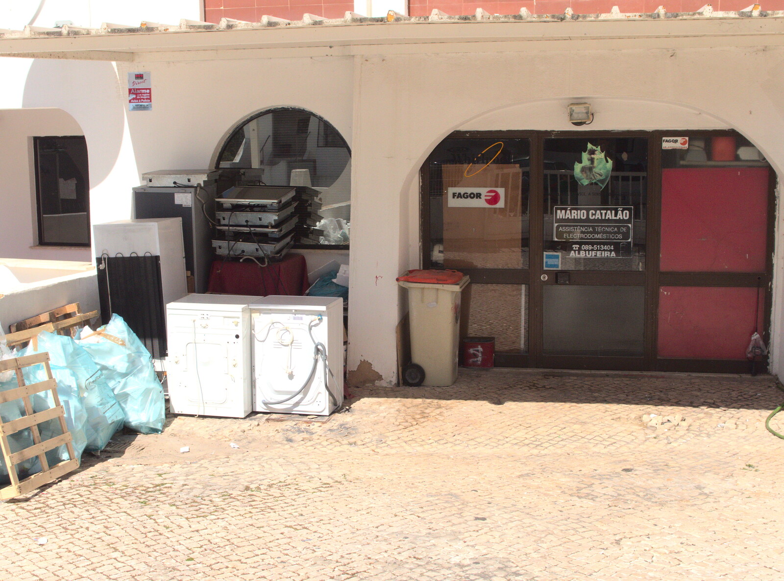 Discarded white goods outside a café from Last Days and the Journey Home, Albufeira, Portugal - 9th April 2016