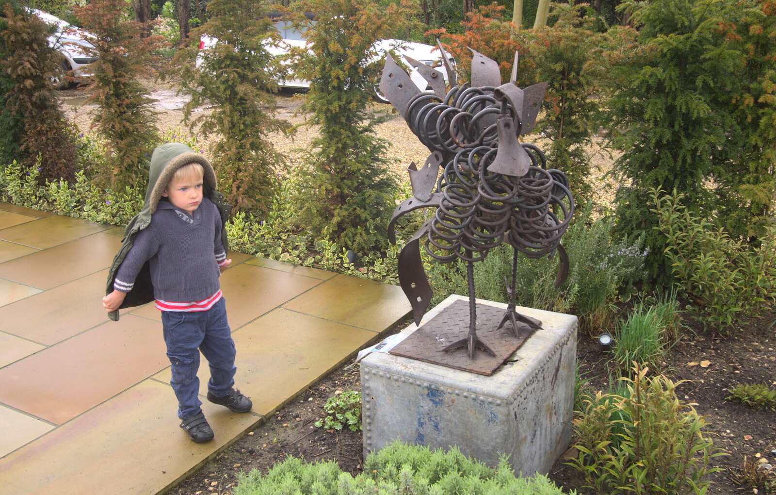 Harry inspects a statue from Harry's Pirate Party, The Oaksmere, Brome, Suffolk - 16th April 2016