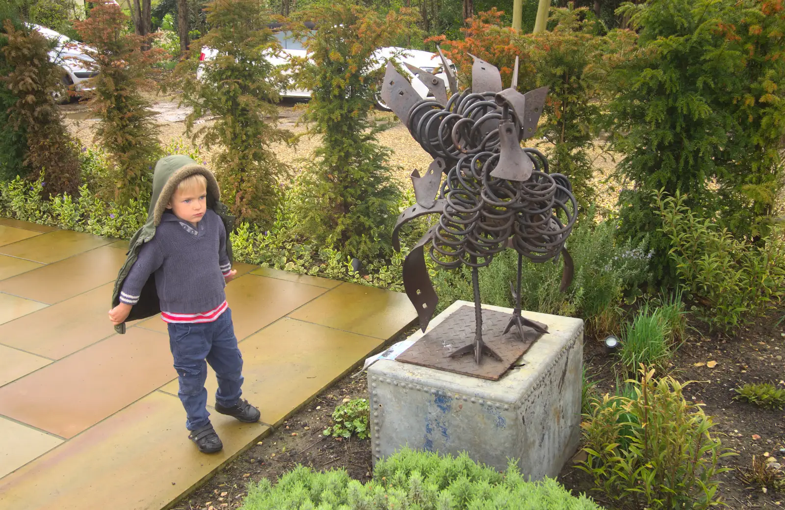 Harry inspects a statue, from Harry's Pirate Party, The Oaksmere, Brome, Suffolk - 16th April 2016